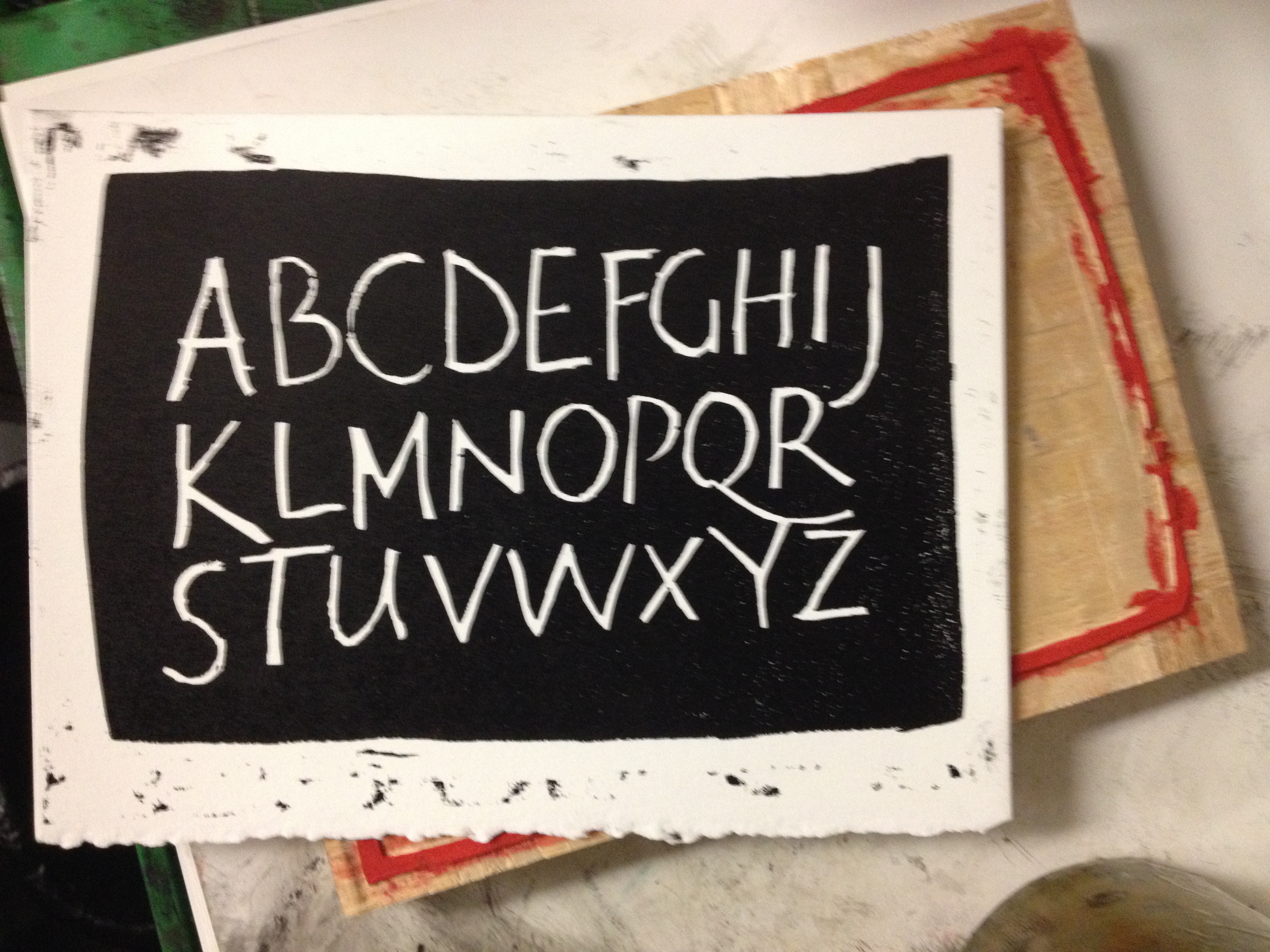 Woodblock alphabet, cut in reverse. Printed letterpress.